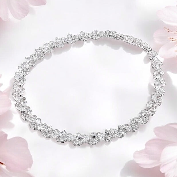 23.56 Carats combines pear, marquise, and round lab grown diamonds set in 950 Platinum